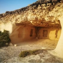 All that is left of the fifth-terrace temple that has lost much of its interior detailing due to erosion and lack of maintenance. Photo credit, Andrea Gibbons