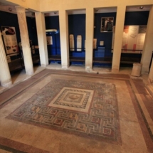 The Domus Romana peristyle or courtyard surrounded by a columns and a covered walkway where the aristocratic owner of the house would meet the public or clients