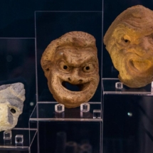 Two terracotta ‘personae’ tragedycomedy masks popular in ancient Greece and Rome, found at the Domus Romana.