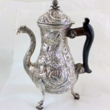 Antique Maltese silver chased coffee pot with black lacquered handle, late Knights&#039; period created by Vincenzo Zammit. Photo Peter Szuhay Antique Silver.