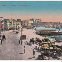 Sliema Ferries - hand-coloured postcard of the Sliema Landing Place, before the road and promenade were widened on land reclaimed from the sea. Image courtesy of Bernard J Schranz