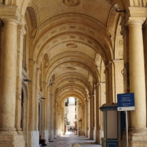 The Biblioteca&#039;s beautiful arched and coffered covered walkway_ another unique feature of the building and the only street to retain its name in French