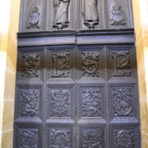 The old portal, made of carved Irish bog wood, which now serves as a door to the vestry