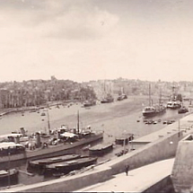 Senglea Creek taken from Cospicua (Bormla) showing the 'sheerlegs' structure to lower masts into ships at the Macina. Photo Frank-Lea Ellis collection