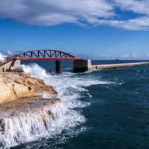 Valletta, Breakwater Bridge struck by a wave, Malta