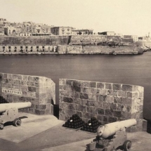 Valletta - view of the entrance to the Grand Harbour photographed from the bastions of Fort St Angelo in the 1870s. Note the St. Elmo lighthouse