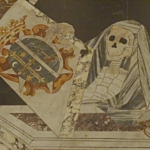 A typically Baroque tomb slab in the style of an upright monument.