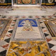 The bishop&#039;s tombstones placed prominently by St John&#039;s main altar_