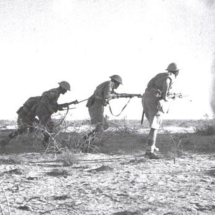 Eighth Army infantry get into the forward enemy positions.