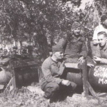 Luftwaffe ground crew prepare bombs on a Sicilian airfield. On one of the bombs there is the inscription Iron greetings for Malta .