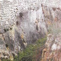 Scarping below the wall in the Binġemma area. (Photo from the information brochure by the then Restoration Unit following restoration works at Binġemma Gap in 2003)