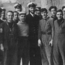 The Royal Navy's most successful submarine commander, M. D. Wanklyn, VC, DSO (centre), with some of the crew of HMS Upholder.