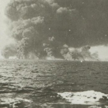 The merchant ship Waimarama explodes after being bombed on August 13, 1942